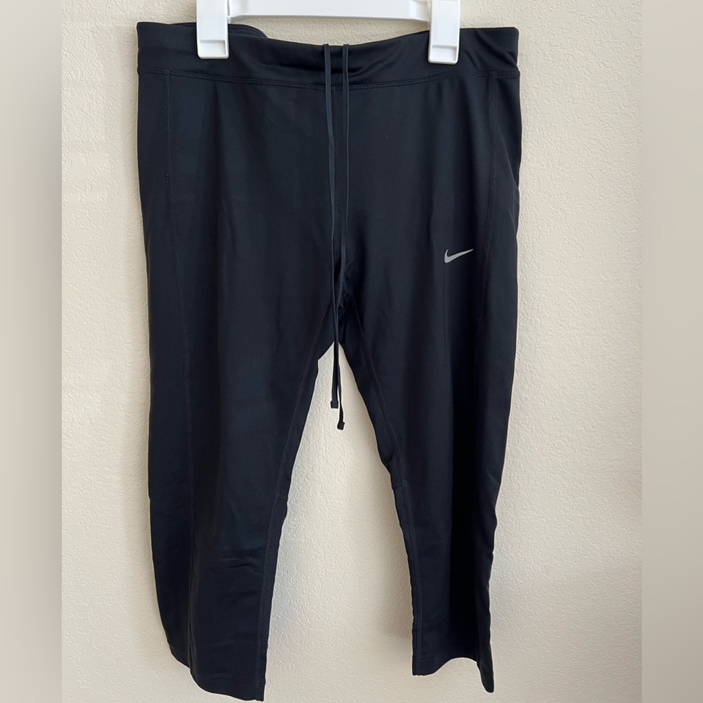 Nike women’s running capris, size M, black